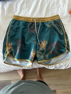 Men's Teal Floral Swim Trunks with Gold Trim by Maamgic